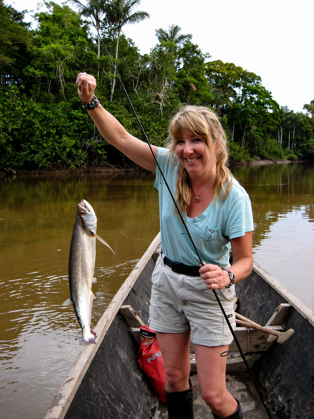 Carol fishing in the Amazon